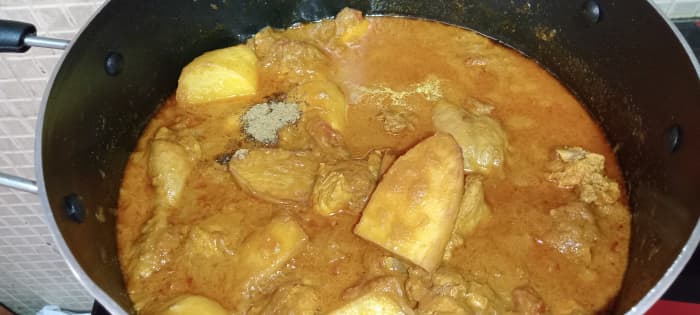 Mix all well. Add some water if required to cook the potatoes with the chicken. Cover and cook until done. Add garam masala powder.