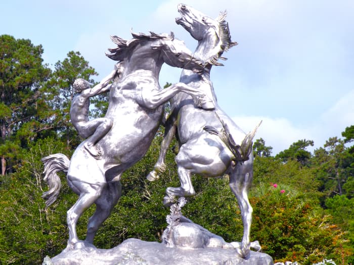 Anna Hyatt Huntington's Fighting Stallions sculpture and fountain is at the entry to Brookgreen Gardens.
