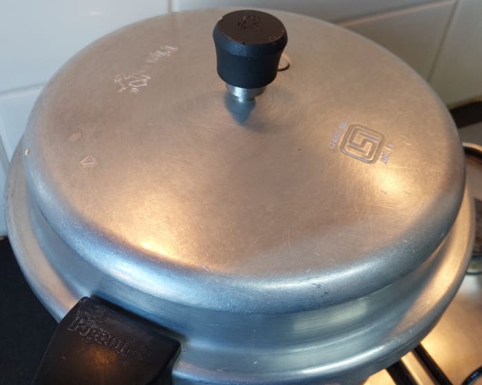 Close the lid of pressure cooker and take 3 whistles. Switch off the flame and let the pressure settles down on its own.