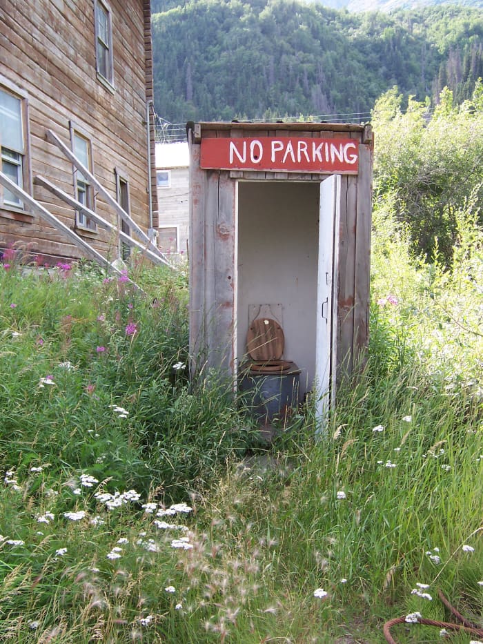 Who says from this crapper you can't see all the way to Russia? Of course, this is unless a dummie with his truck blocks your view.