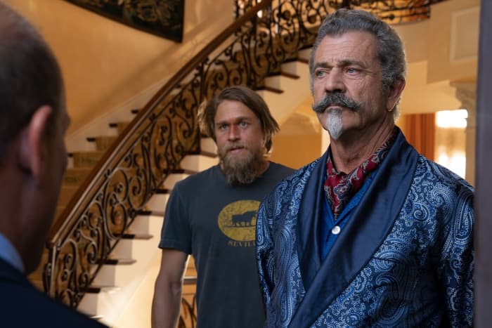 (L-R_ Charlie Hunnam as Charlie Waldo and Mel Gibson as Alastair Pinch in the action/comedy, LAST LOOKS, an RLJE Films release. Photo courtesy of RLJE Films.