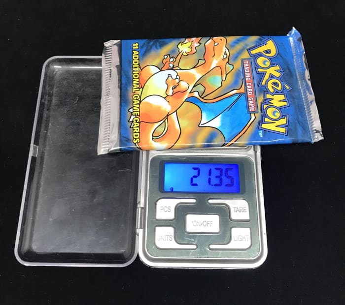 When purchasing vintage booster packs, many will be informed of the pack's weight. The weight gives buyers insight into the likelihood that their pack contains a holographic card.