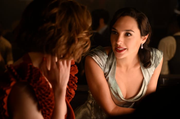 Emma Mackey and Gal Gadot as Jacqueline de Bellefort and Linnet Ridgeway in, "Death on the Nile."