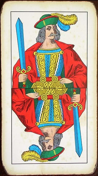 Knave of Swords ("fante di spade") from an Italian deck. The Knave of Swords is related to intelligence, emerging ideas, curiosity, and chatter.