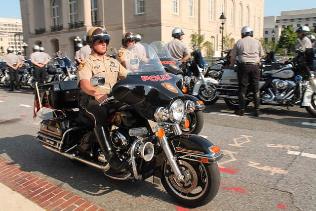 2014 National Police Week: Assemblance Before 26th Annual Candlelight Vigil at the National Law Enforcement Officers Memorial in the 400 block of E Street, NW, Washington DC on Tuesday evening, 14 May 2014