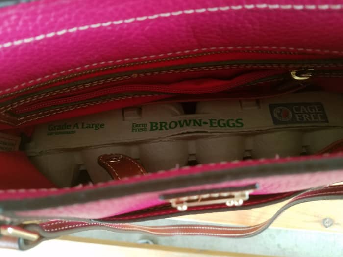 Remember, push the carton in sideways. The egg dimples can also hold small items such as vitamin packets.