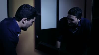 Terrell spotted the mirror. It took up an entire wall. He saw his pathetic image staring back at him.