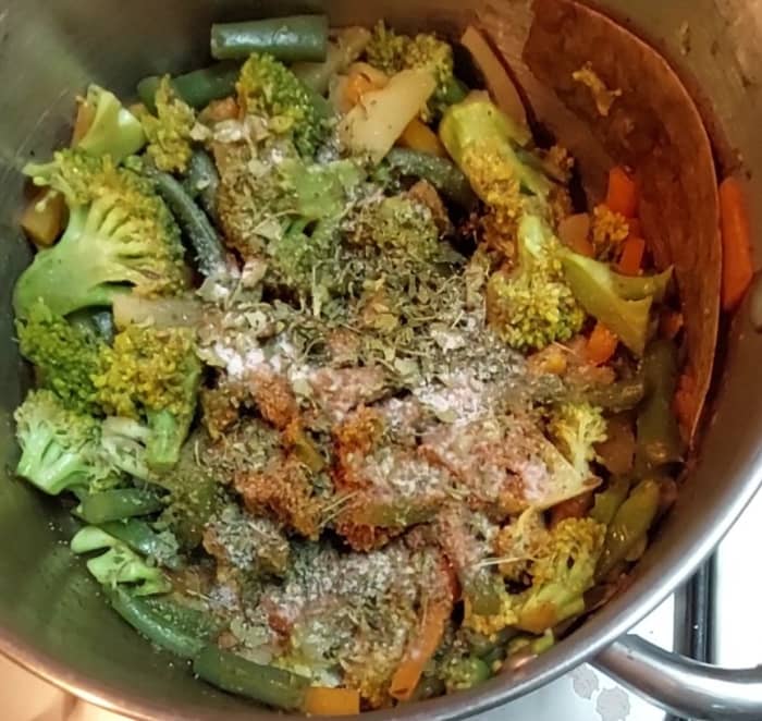 Once vegetables are cooked, add 1/2 teaspoon garam masala powder and 1 tablespoon kasuri methi (dry fenugreek leaves). Mix well. Adjust salt if necessary.