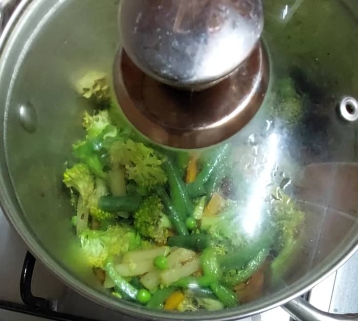 Mix till vegetables are well coated with spices and sauces. Close the lid and cook for 10 more minutes or till vegetables are well cooked (but not mushy).