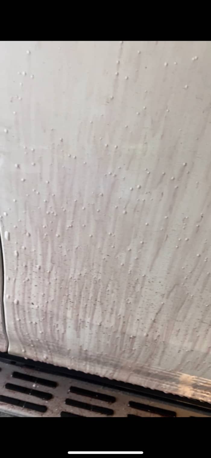 This is what happens when the Iron Remover comes into contact with Iron contamination. This also helps break down some tar and other calcified contamination on the paint prior to washing the vehicle.