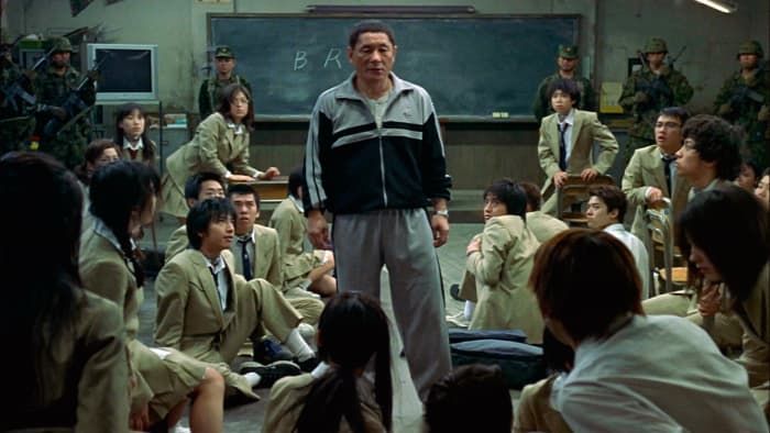 Kitano (centre) is both tragic and terrifying as the teacher at the end of his rope, instigating the ultimate in class discipline...