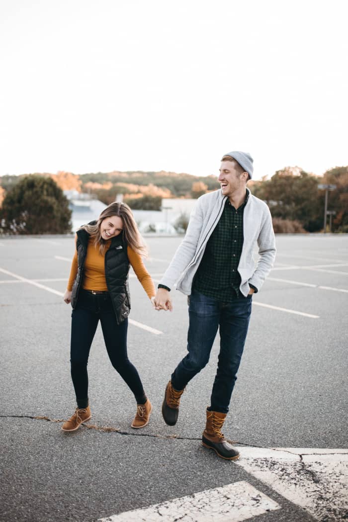 You can tell a guy likes someone when he laughs a lot, smiles, and holds their hand. Dead giveaways right there.