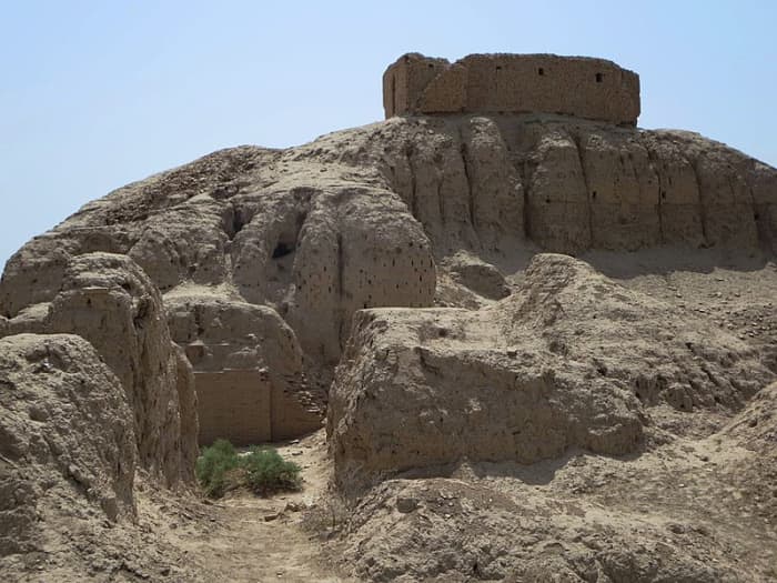 The ruins of a Sumerian temple in present-day Iraq. Sumerian city-states were built around temples dedicated to their patron deities (in this case, the wind god Enlil).