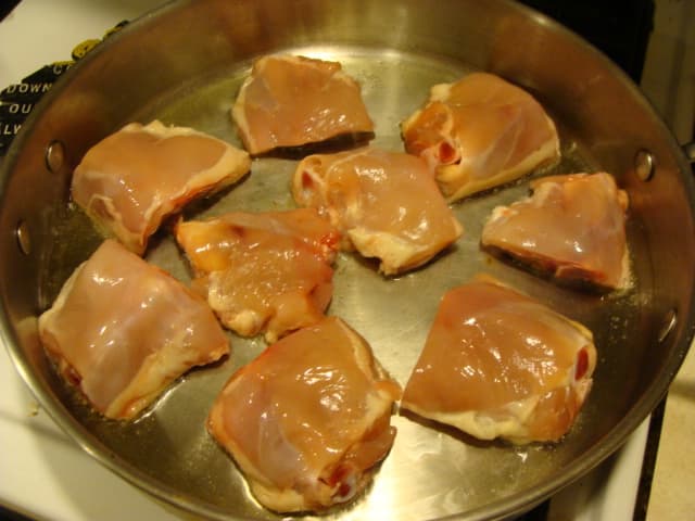 Gently cook your chicken on both sides. You don't want to overly brown it at this point, it will finish cooking in the sauce later.