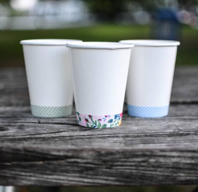 personalize a custom party cup by wrapping washi tape around the base, Use holiday and the themes of your choice