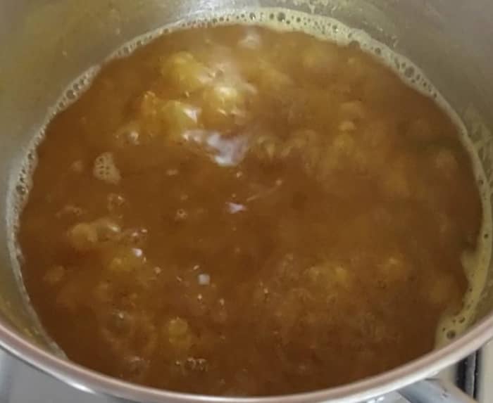 Adjust salt and jaggery if required. Add water if required to adjsut the consistency. Switch off the flame.