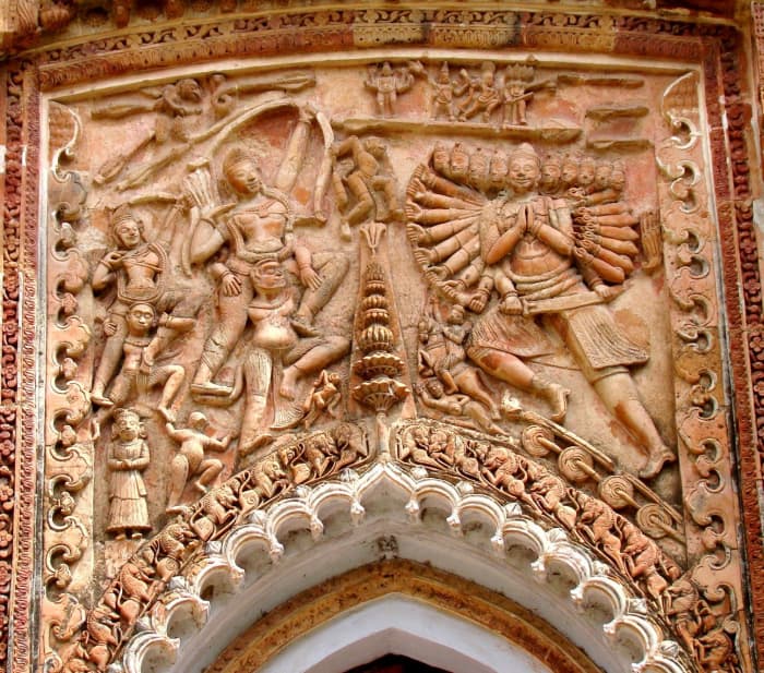 Hanuman carrying Lord Rama on his shoulder during battle with Ravana; terracotta; Charbangla temple; Baronagar, Murshidabad