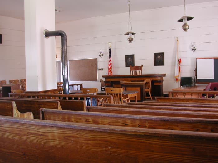 The "Oak Grain" on the benches is painted on to make the simple pine benches look more expensive. Photo by Linda Gast