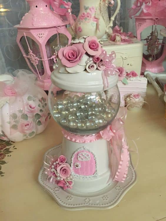 Look closer at this elegant fairy house—that's a glass bowl, a flower pot and a ceramic plate and bowl!