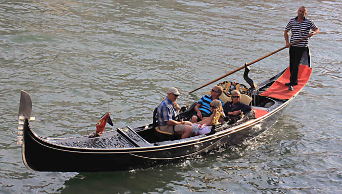 As well as architecture, the Grand Canal is renouned for its water borne transport. Barges packed with merchandise, motor boats, and vaporetti navigate the canal. But most of all the canal is forever linked to the long black boats known as gondolas