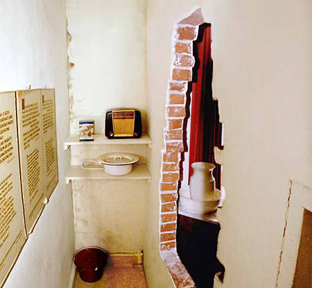 The Hiding Place was behind a fake wall in the ten Boom home. The home is now a museum where the wall has been opened up to allow visitors to see the small space where people hid.