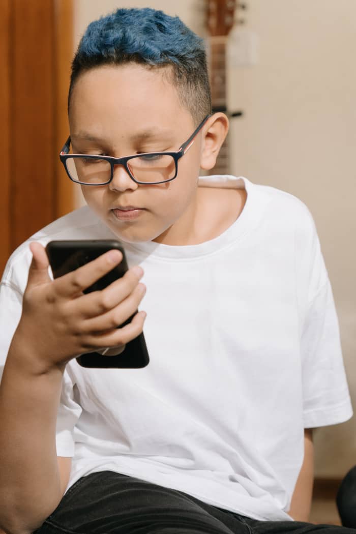 Students' social-emotional development would be helped by a ban on cell phones in middle school.