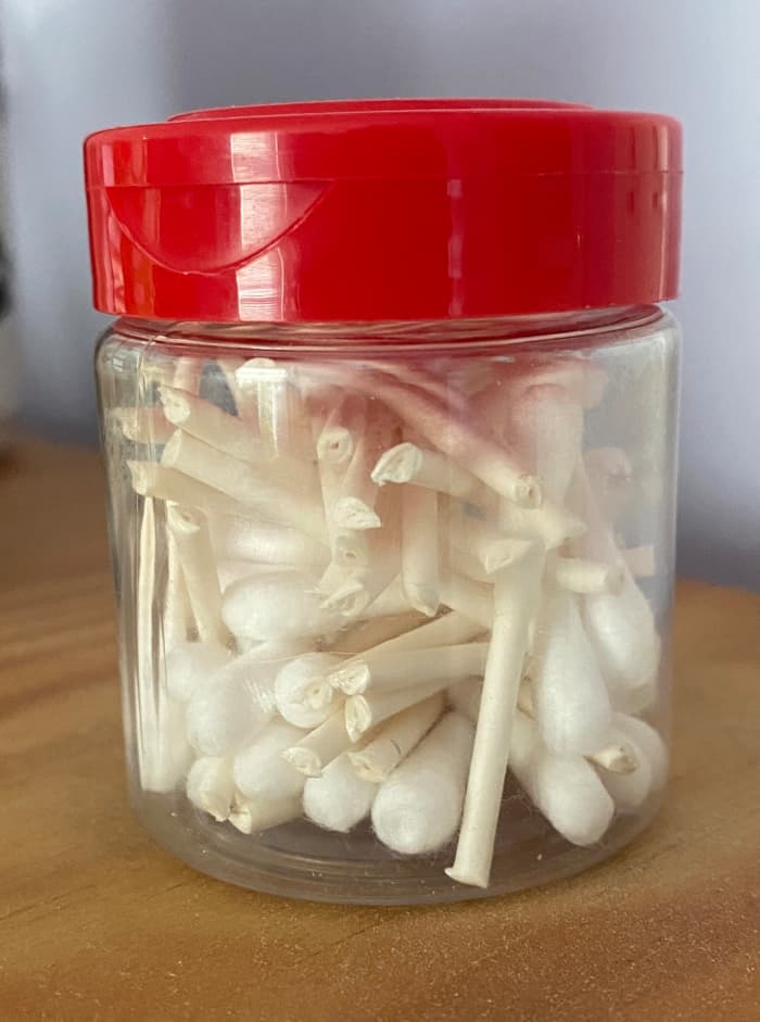 Unscented Q-tips can be stored in any jar, but make sure it is thoroughly washed if it once had food in it.