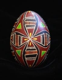 This egg has the cross and triangles which represent the Holy Trinity. I like this egg's unusual, almost African look.