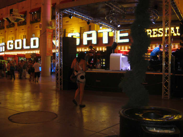 The Golden Gate Hotel on Fremont Street, the oldest hotel in Las Vegas. It's motto is what happens in Vegas started here. The guy in the dress out front? A pretty common "Fremont Street Experience."