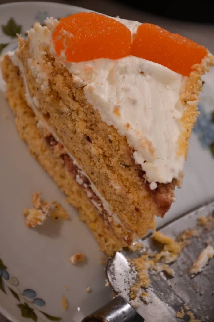 I love the light orangish hue of the cake. The orange candies add a strong pop of color that makes the cake more appetizing.
