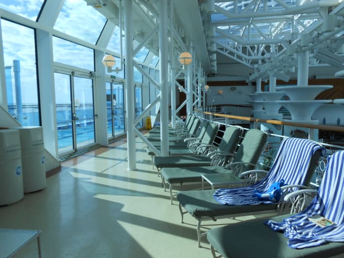 There are plenty of quiet places for couples to spend time relaxing, such as in the solarium on the Sapphire Princess cruise ship.