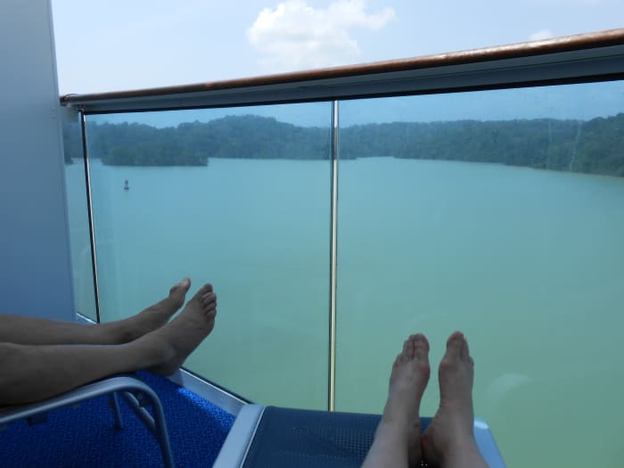 Cabin balconies provide romance for couples who just want to chill out together on a lazy afternoon cruising on the waterways, such as on the Coral Princess on a cruise through the Panama Canal.