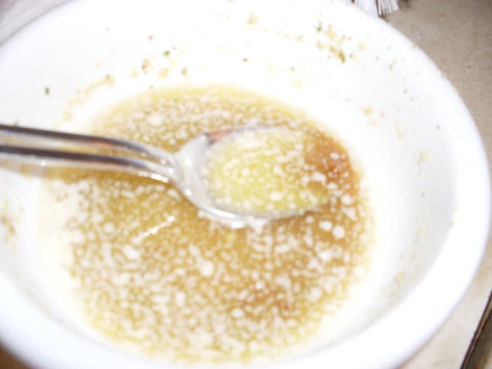 RRECIfor the ham glaze, pictured above, I stir half a stick of melted sweet cream butter (not margarine or butter substitute), 2 teaspoons of brown sugar and just a few drops of honey together. I also add just a teaspoon of minced garlic to this mix