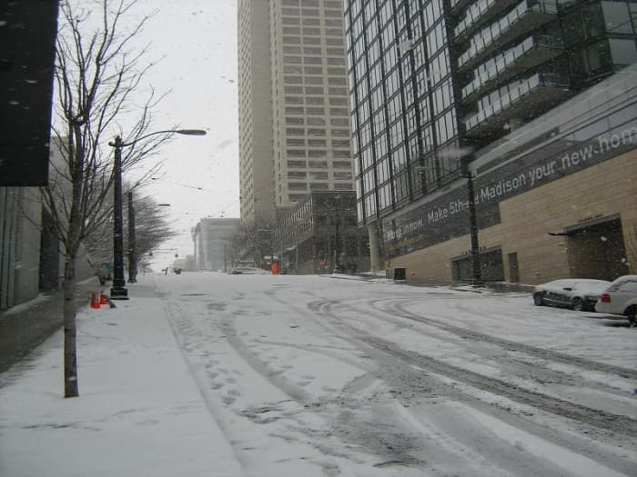 The taker of this 2008 Seattle photo stood at 4th and Madison, less than half way down the hill from where I would stand against the lamppost near 6th.