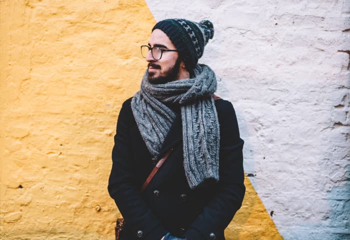This person looks very put together, which is typical of a Taurus. The scarf accentuates the neck, and the hat has Taurus' power color.