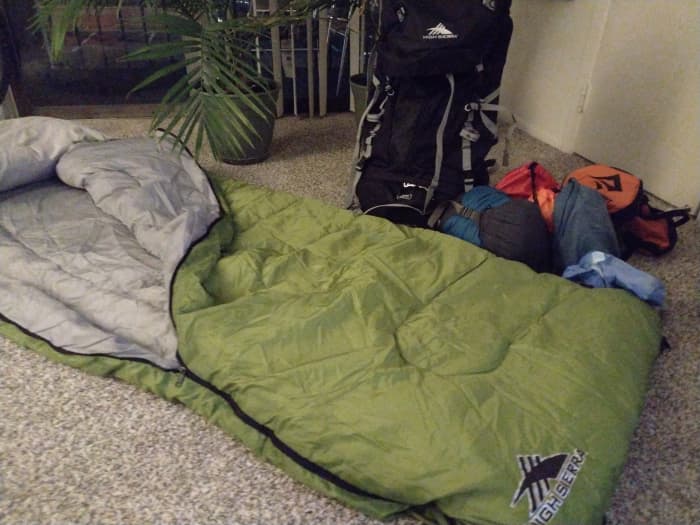 Getting packed and ready to go with the High Sierra Sleeping Bag and the High Sierra Classic 2 Series Summit 45L Internal Frame Backpack