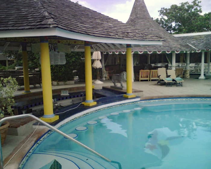 Below is a photo of my husband and I having some cocktails in the pool. He is n the pool, I am in the hot tub.