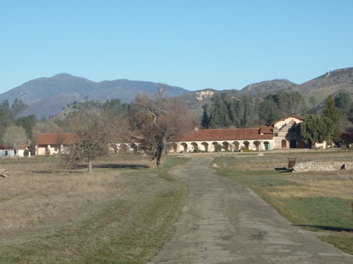 Mission San Antonio de Padua, Jolon (Ft. Hunter-Liggett), California. Junipero Serra Peak is in the background on the left.