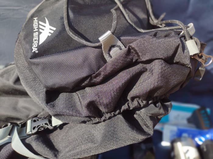 Close-up of the rugged, high-quality construction materials and hex pattern ripstop nylon.
