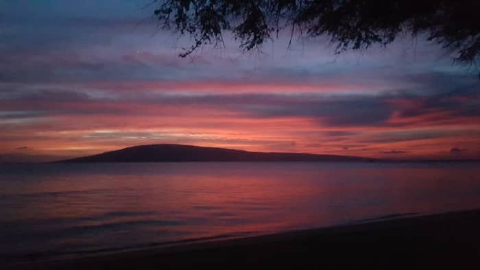 The sun setting over Lānaʻi island, viewed from west Maui (no filter). My favorite thing about sunsets and the ocean is that they are free to all, it's a beautiful wealth we all get to share.