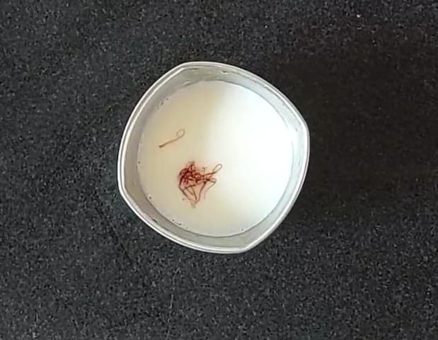 To a bowl, add 1/4 cup of warm milk and add 1/4 teaspoon of saffron strands. Mix well and set aside.