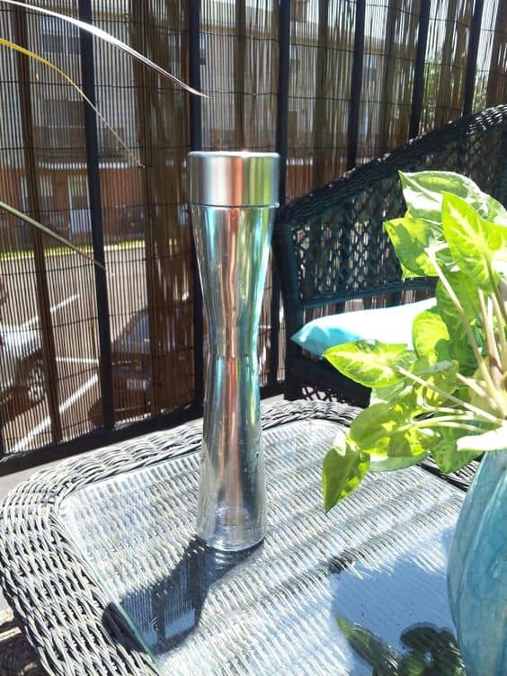 Dollar Store vase + dollar store solar light + Looking Glass Spray paint = Faux Mercury Glass Solar lamp