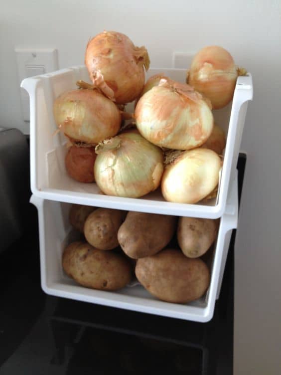 Here is a space efficient idea to help store your non-refrigerator-needed produce. Purchase these bins at the Dollar Tree.