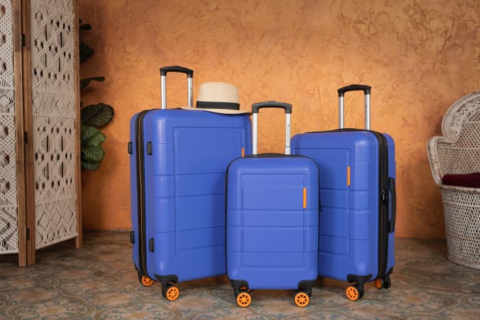 Owning a brightly-colored suitcase can help you distinguish your own belongings from a lineup of dark and neutral tones!