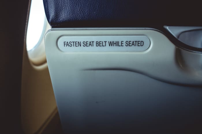 Investing in a seat belt extender can make your seated time on the plane feel more comfortable.