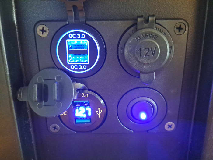 The side of the portable power station with the upgraded 4-in-1 USB panel from Amazon