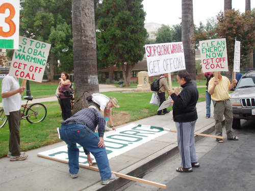 Picketing in public places gets the attention of passersby, who often honk in agreement.