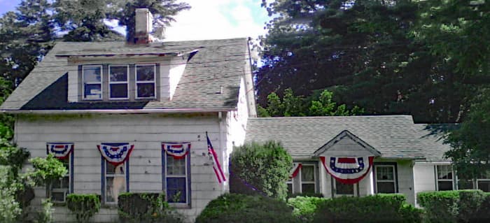 The second story was my brother's. 2 bedrooms, a bathroom & hallway. The 3 windows below the dormer were to my mother's room. Behind her room room was the living room.