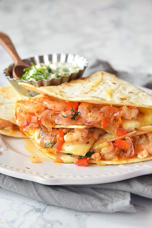 Quesadillas comes from the regions of Mexico and were first made with corn masa but things have really changed because they are made from so many things and can be prepared in so many ways. Today I going to share with you a recipe for Chapati Seafood