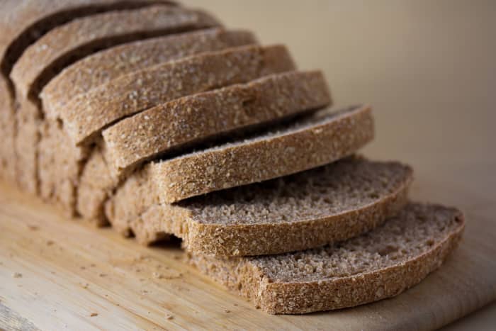 Just because a bread is brown does not mean it is whole wheat. Often they will use molasses to get the nice brown coloring.